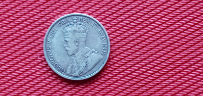 1914 CANANADIAN STERLING SILVER 50 CENT COIN IN VERY NICE CONDITION,