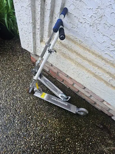 2 razor skooters, View more