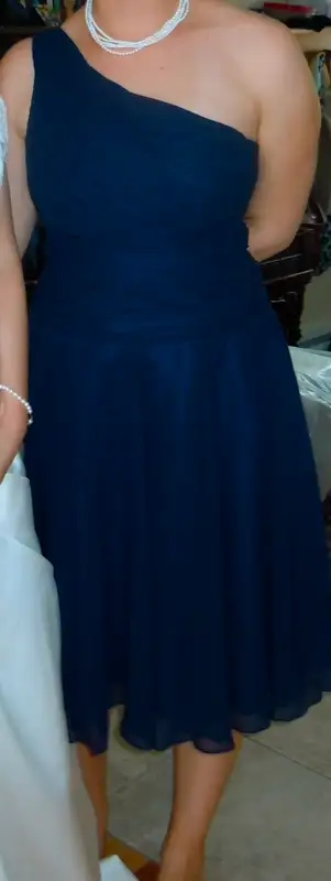 Grandeur 12 ans, couleur bleue, achetée chez Betty Rubbins.