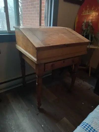 This used, antique-style wooden writing desk features a unique design with a lift-top and ample stor...