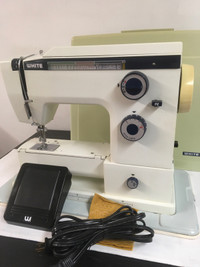 710 model WHITE PORTABLE sewing machine 