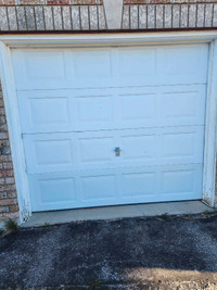 8x7 Steel non insulated garage door. Complete and removed. $250