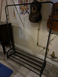Clothing rack with coat hooks and shoe shelf 