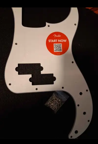 Brand new fender squire made in china precision bass pickguard 13 hole with protective film on it $1...