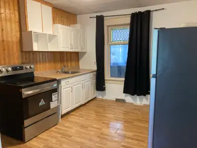 3 bedroom/1 bathroom one and 3/4 storey single detached house located close to Kern Park. Stove and...