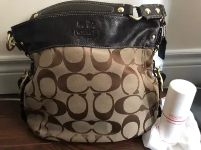 Coach Purse, Wristlet, & Fabric Cleaner, View more