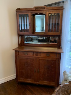 Antique Sideboard / Hutch with beveled glass and mirrors., View more