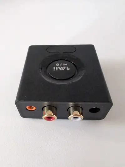 This 1mii B06TX is a Bluetooth transmitter for stereo, powered speakers, or TV audio, offering a sea...