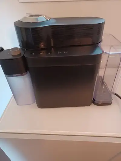 Brew barista-quality coffee and espresso from the comfort of your home with this Nespresso Vertuo La...