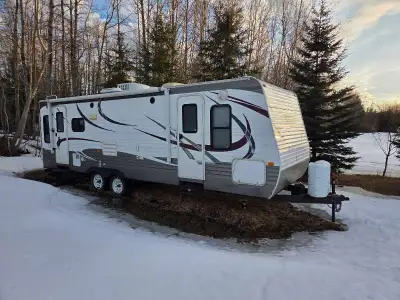 2012 Keystone Hideout Model 26RLS. original owner. super slide, kitchen table and sofa slide out. al...