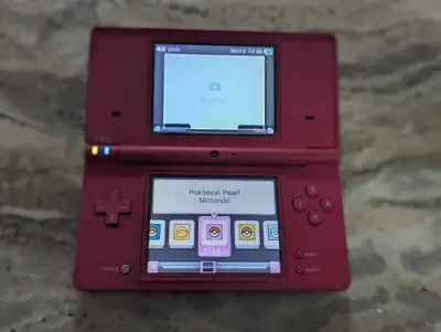 32 GB Nintendo Pink DSI 1500 + Games 32 GB Pink DSI on custom firmware with 1500+ Games on memory Gr...