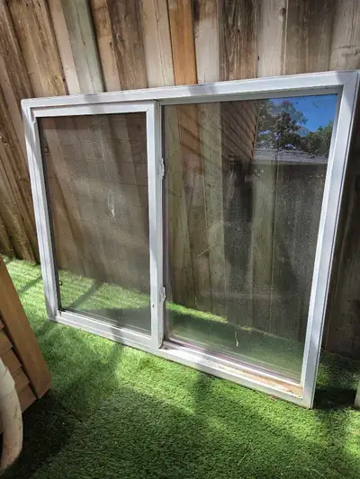 Vinyl sliding window - large with screen. Great condition, View more