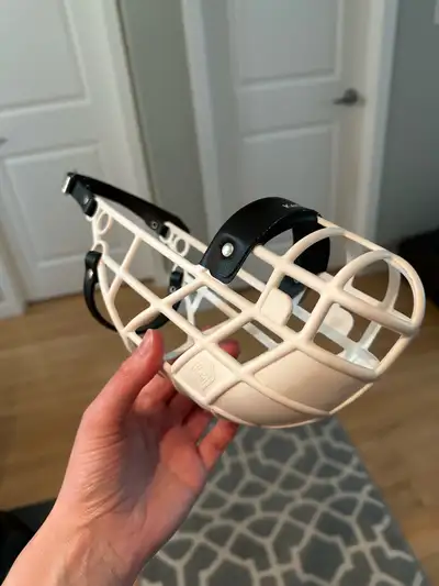 Dog muzzle with built-in guard to prevent your dog from eating poop (or other gross things) or to he...