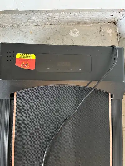 Get moving with this compact and portable folding treadmill, perfect for small spaces and easy stora...