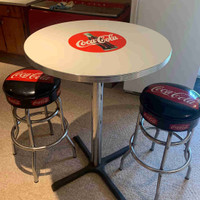 Coca Cola table,   stools and ceiling fan .  