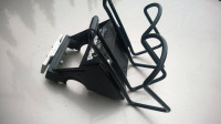 Rear mounted double bottle cage and spare tube holder