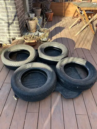 Four used Dunlop P195/65R15 all-season tires. These 4 tires are worn, but have some life left in the...