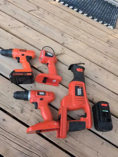 This Black and Decker set includes a cordless drill, a reciprocating saw, and a flashlight, all powe...