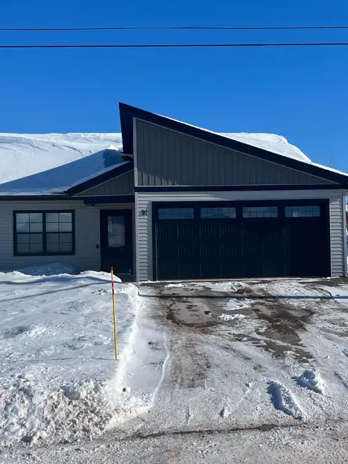 Newer 3 bedroom, 2 bathroom duplex with an attached 2 car heated garage for rent. Available March 1....