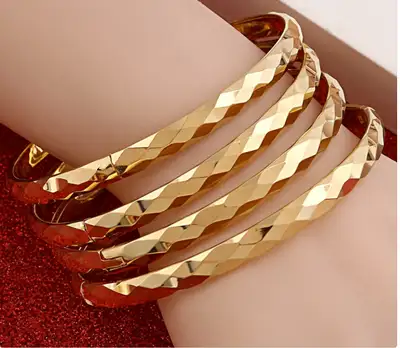 Spectacular 24 k gold plated bungle ,unbelievable , View more