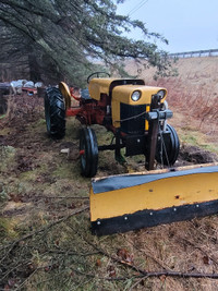 Case 210b tractor with plow