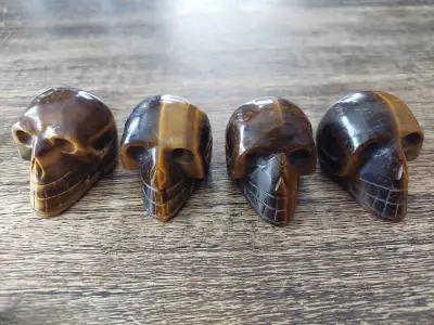 Tigers eye gemstone skulls, View more