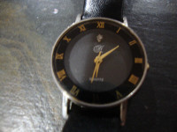 Woman's Black Face and Black Leather Band Dress Watch
