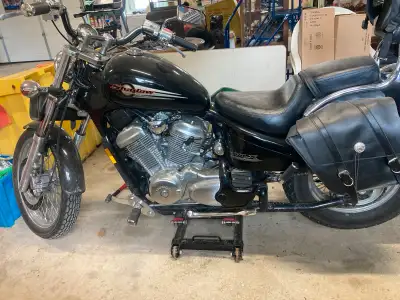 Low km Honda Shadow VLX in excellent condition and always stored indoors. Open to reasonable offers....