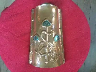 A good quality English arts & crafts copper wall sconce/pocket with three large abalone insets,c.190...