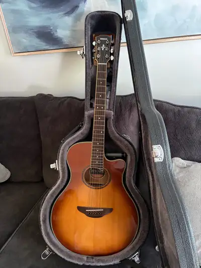 Only a couple years old with no scratches or dents. The Yamaha APX700II is a thin-line electro-acous...