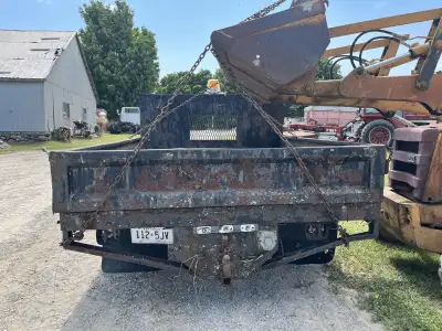 Used truck box. 10 feet long. 90 inches wide. Fold down sides. Tailgate. Off of 1 ton truck 500 OBO