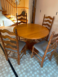 Custom made Solid oak table and 4 chairs.