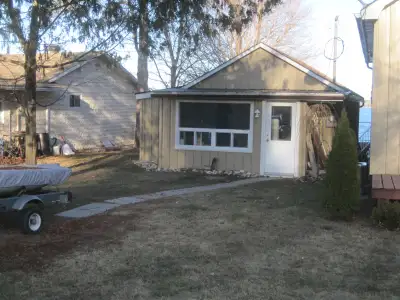 Spacious four-season apartment style cottage with gorgeous view of the Ottawa River, in a safe, quie...