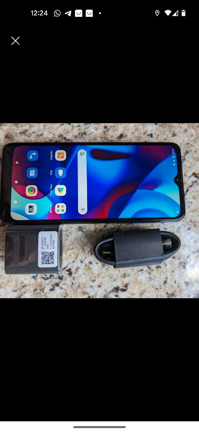 brand new Motorola pure phone unlocked delivery extra in Cell Phones in Calgary
