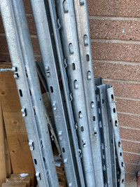 Galvanised posts with hooks and holes