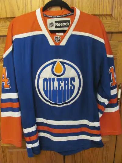 Jordan Eberle #14 Oilers Jersey Oilers Team Apparel , size M Reebok , size 48, $100 each Youth size...