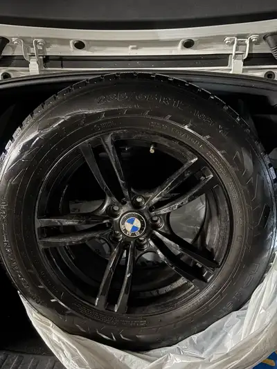 235/65R17 108T XL, mounted on a sleek BMW black rims. Here are the specifications: * Tire Size: 235/...