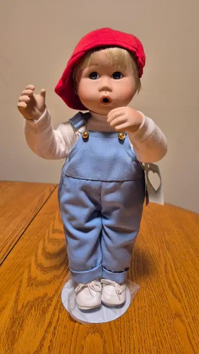 Ashton Drake Collectible Dolls in mint condition. Dolls were kept in curio cabinets free from dust....