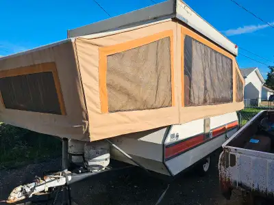 This is a 1976 Bonair tent trailer, perfect for those looking to embark on vintage camping adventure...