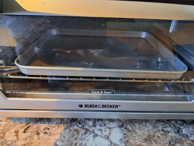 Four grille-pain Black & Decker451655680929320961