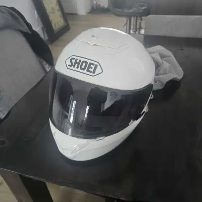 Shoei Motorcycle Helmet women's small. Like new never dropped. In perfect condition. No scratches.