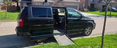 2010 Dodge Grand Caravan 105,000km Side entry ramp manual very smooth Used to be powered ramp discon...