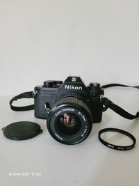 Nikon EM SLR 35mm Film Camera W/35-70mm F/3.5-4.8 Lens 