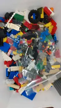 Lego box with lego figures and bikes