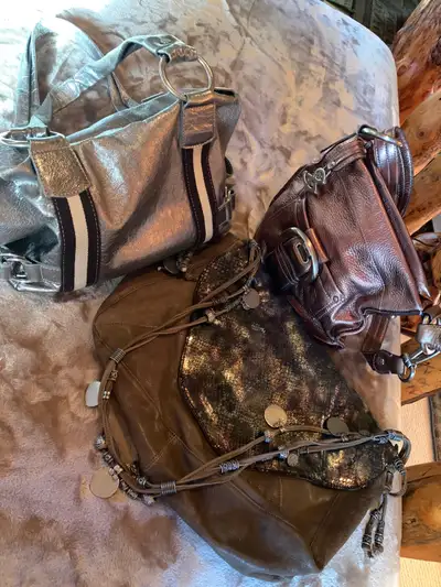 Delicious butter soft leather purses, new, not been used, perfect condition. $40 each