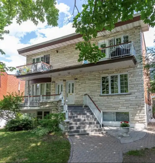 This beautifully renovated apartment in a very quiet neighborhood, close to two highways and REM off...