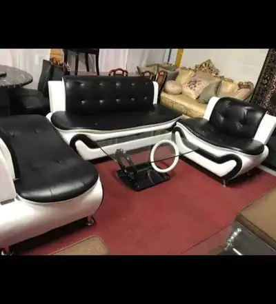 This is a brand new sofa set ready to elevate your living space with style and comfort. It features...