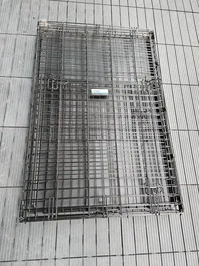 I'm selling a large dog crate from iCrate, it has 2 doors to allow it to be positioned in multiple w...