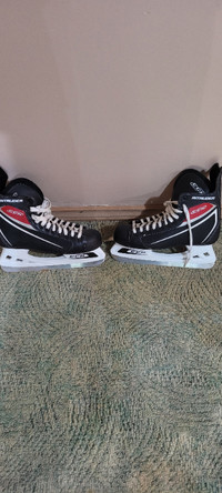 New pair of mens size 10 skates for sale.