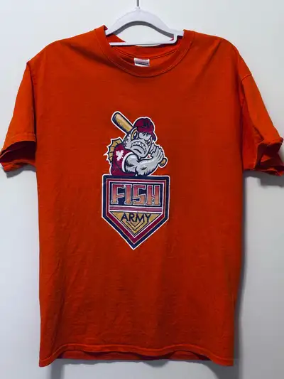 Selling a Winnipeg Goldeyes Gear t-shirt in size medium. It's a vibrant orange colour with the Fish...